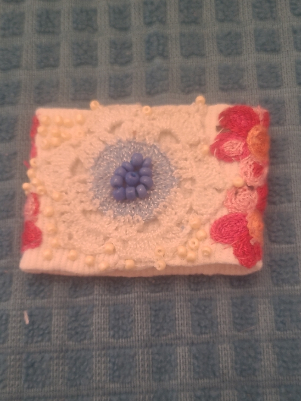 Delicate White Crochet Bracelet with Blue Bead Accent